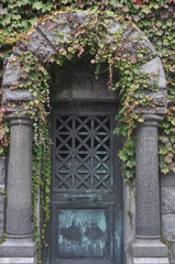 Old Forgotten Mausoleum Overgrown with Ivy