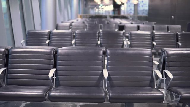 Empty airport terminal waiting area with chairs lounge with seats in the airport