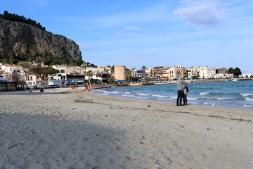couple on the beach, sicily, mondello