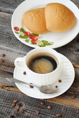 Delicious Americano coffee and pies on the table 