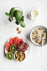 Fruit nuts bowl for a healthy break, breakfast, snack to the granola. Top view. flat lay.