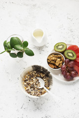Fruit nuts bowl for a healthy break, breakfast, snack to the granola. Top view. flat lay.