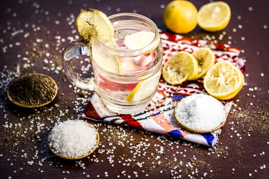 Close up of Indian most popular summer drink Nimbu pani or Nimbo sarbat,Lemonade in a transparent glass with salt.