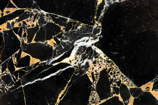surface of golden black marble pattern luxury interior design