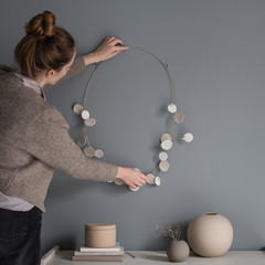 Interior Designer at work decoration a wall