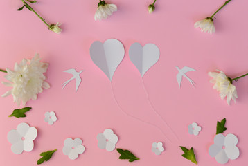 White flowers, hearts, birds on pink background