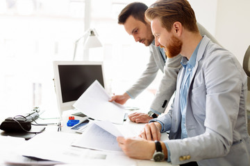 Fototapeta premium Coworkers planning startup goals