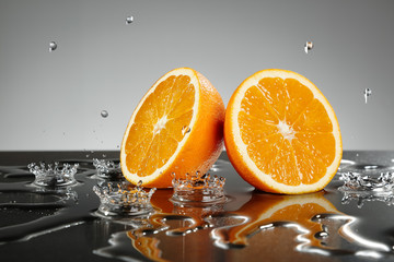 Orange slices with water drops