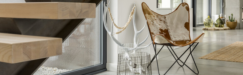 LEather chair and antlers