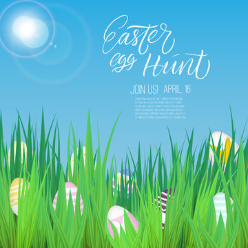 Easter Egg Hunt poster with grass and realistic eggs. Modern brush calligraphy.