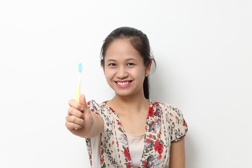 the woman with tooth brush