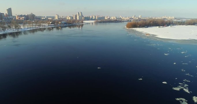 aerial view to the Dneper River along the Obolonskaya embankment in winter