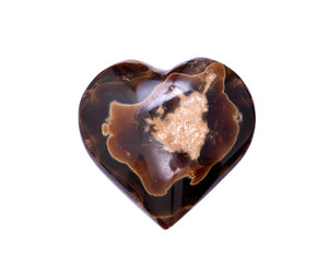 Polished aragonite heart from Peru isolated on white background