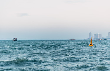 calm sea ocean city coast skyline in evening view seascape