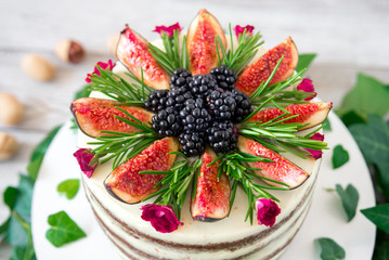 delicious and very pretty carrot walnut cake with figs, BlackBerry and rosemary