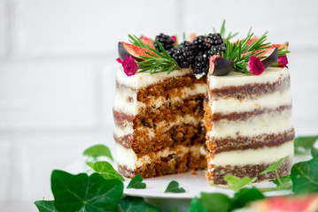 delicious and very pretty carrot walnut cake with figs, BlackBerry and rosemary