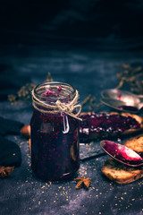 Raspberry jam in a glass jar