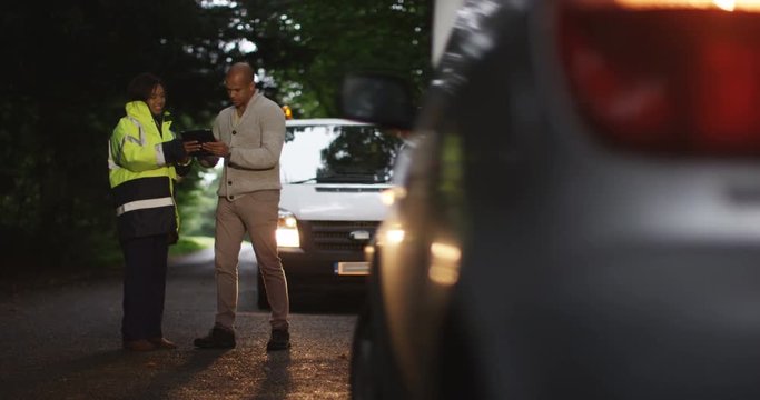 4k, Man shaking hands with a female roadside mechanic.