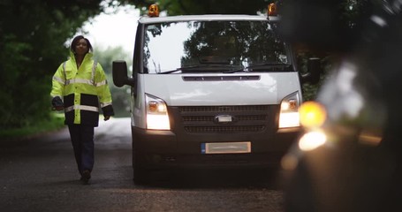 4k, Roadside mechanic arriving to help a stranded customer.