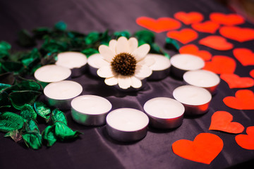Valentine's Day, romantic design, candles in the form of heart with petals