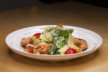 Caesar Salad plate with chicken breast pieces