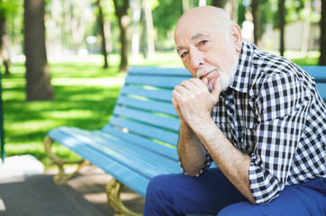 Fototapeta premium Pensive senior man outdoors