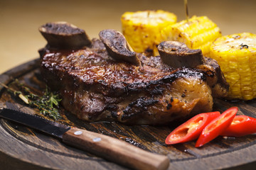 Fried ribs of marbled beef served, closeup