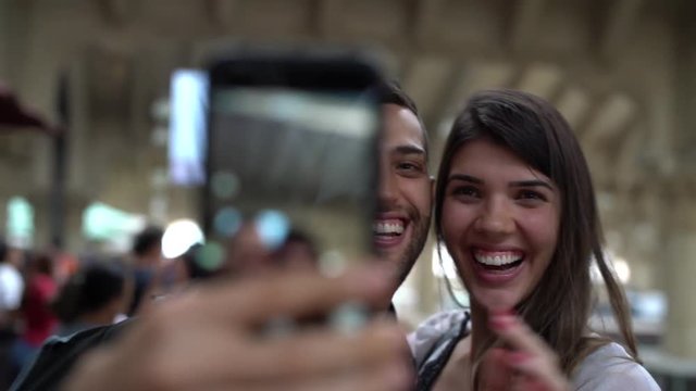 Young Couple Taking a Selfie with Mobile in Municipal Market (Mercadao), Sao Paulo, Brazil