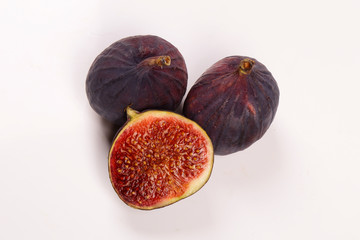 Fresh figs isolated on white background. Figs cut in half, in section