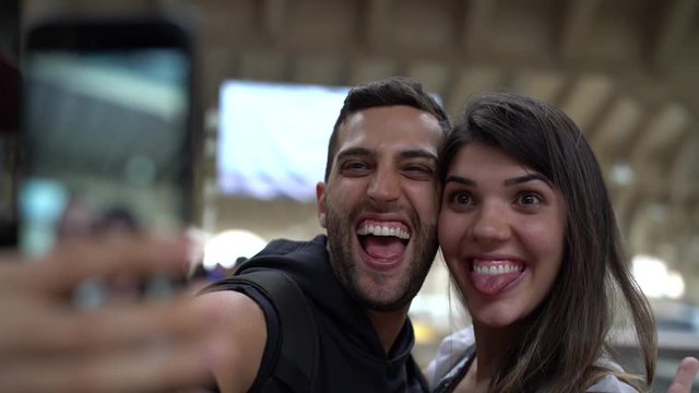 Young Couple Taking a Selfie with Mobile