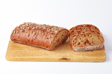 Cut bread with beets and sunflower seeds.