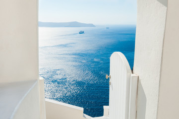 Fototapeta na wymiar Santorini island, Greece. Luxury greek resort. White architecture and blue sea.