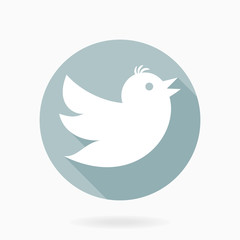 Fine vector fine icon with white flying bird in the blue circle. Flat design with long shadow