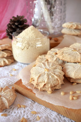 Obraz na płótnie Canvas Meringue cookies with pine nuts and almonds