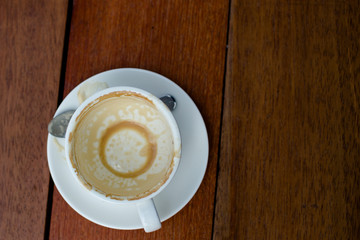 empty coffee white cup on wood table