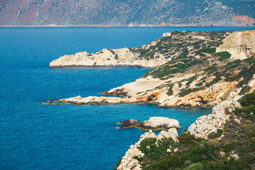 Fototapeta na wymiar Rocky coast near Agios Nikolaos on Crete, Greece