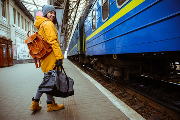 woman on railway station near train