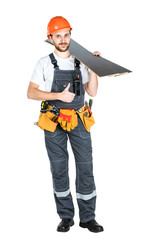 A construction man with boards or laminate in his hands. Repair and construction. Isolated over white background.