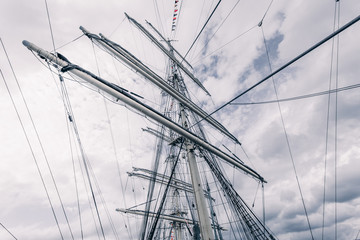 Old sailing ship mast. Tall ship rigging detail.  Masts and rigging of a sailing ship