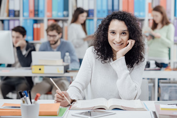 University student reading a textbook