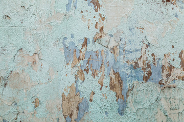 Shabby wall with broken cement plaster. Old surface texture for loft interrior