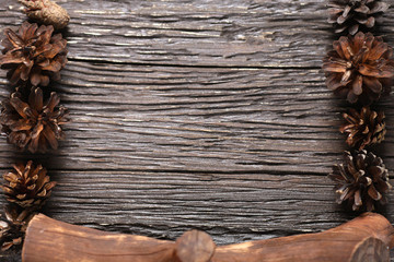 pine cones on a wooden table