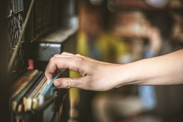 Close up. Woman hand taking documents.