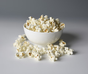 Popcorn spilling out of bowl