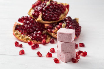 marshmelow and pomegranate on the table