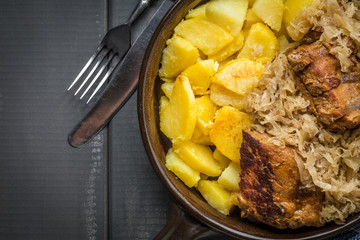 Fried ribs in sauerkraut.