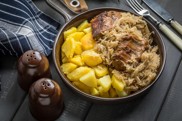 Fried ribs in sauerkraut.