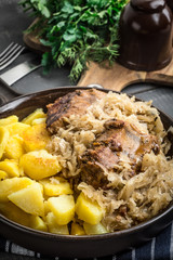 Fried ribs in sauerkraut.