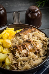 Fried ribs in sauerkraut.