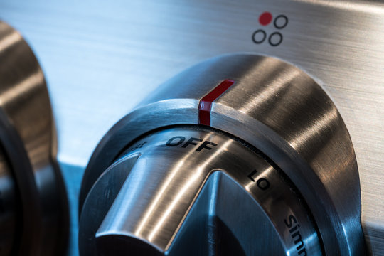 Stainless steel control knob on cooker